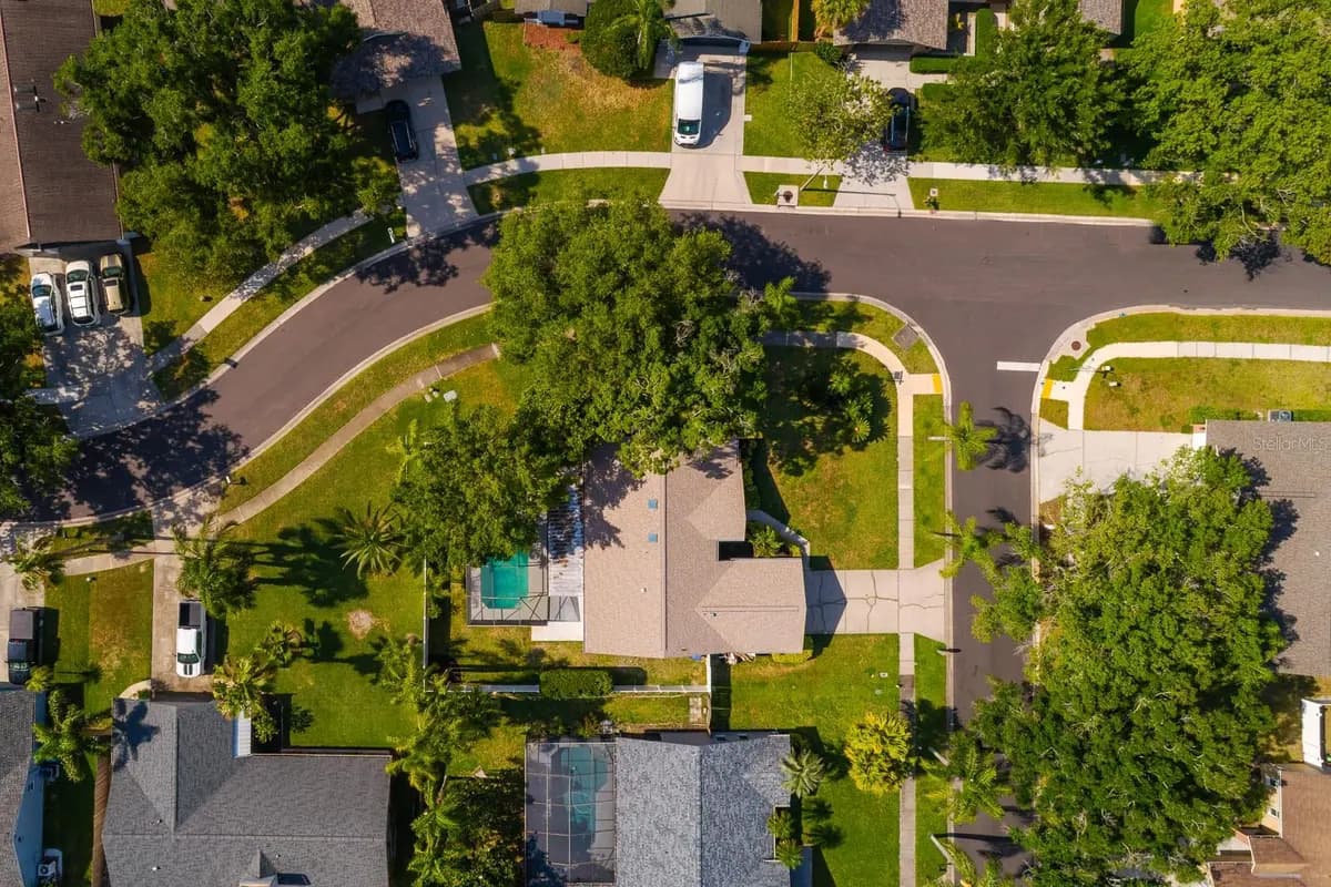 Aerial view of a featured Palm Harbor property and surrounding neighborhood