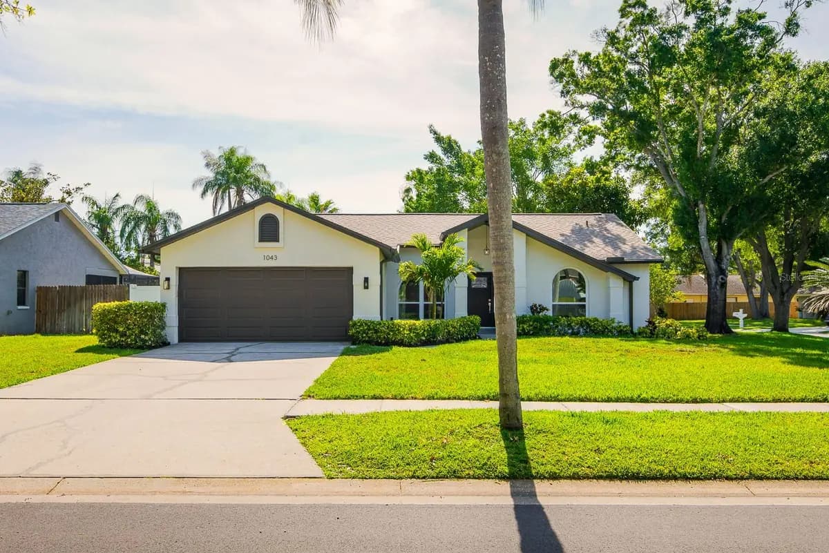 Front exterior of a featured property on Ridge View Lane in Palm Harbor