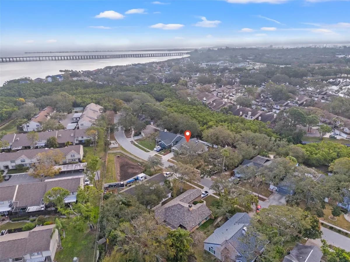 Aerial neighborhood view around a featured Clearwater property