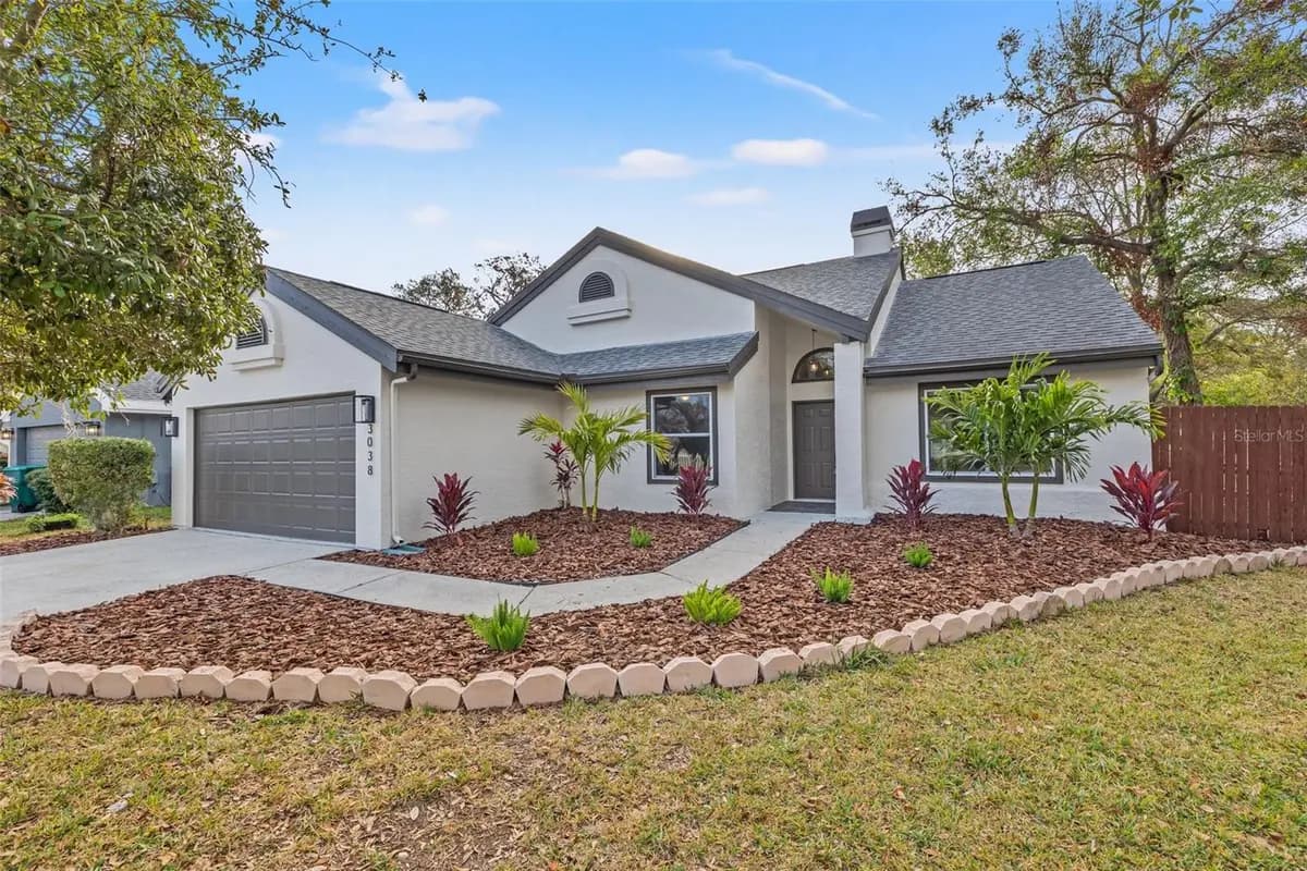 Front exterior of a featured property on Longbrooke Way in Clearwater