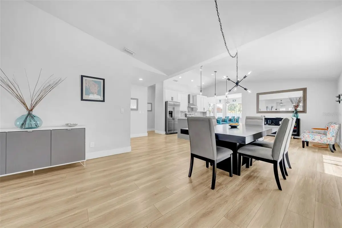 Dining and open kitchen interior of a featured St. Petersburg property
