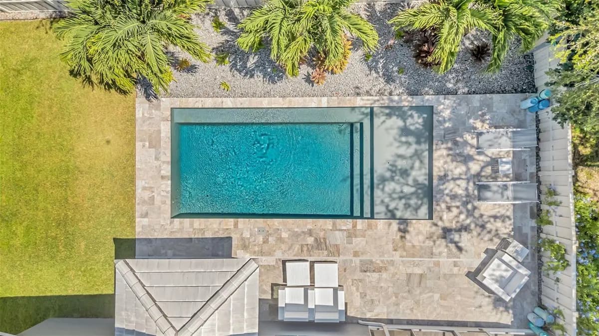 Aerial view of the pool and patio at a featured St. Petersburg property