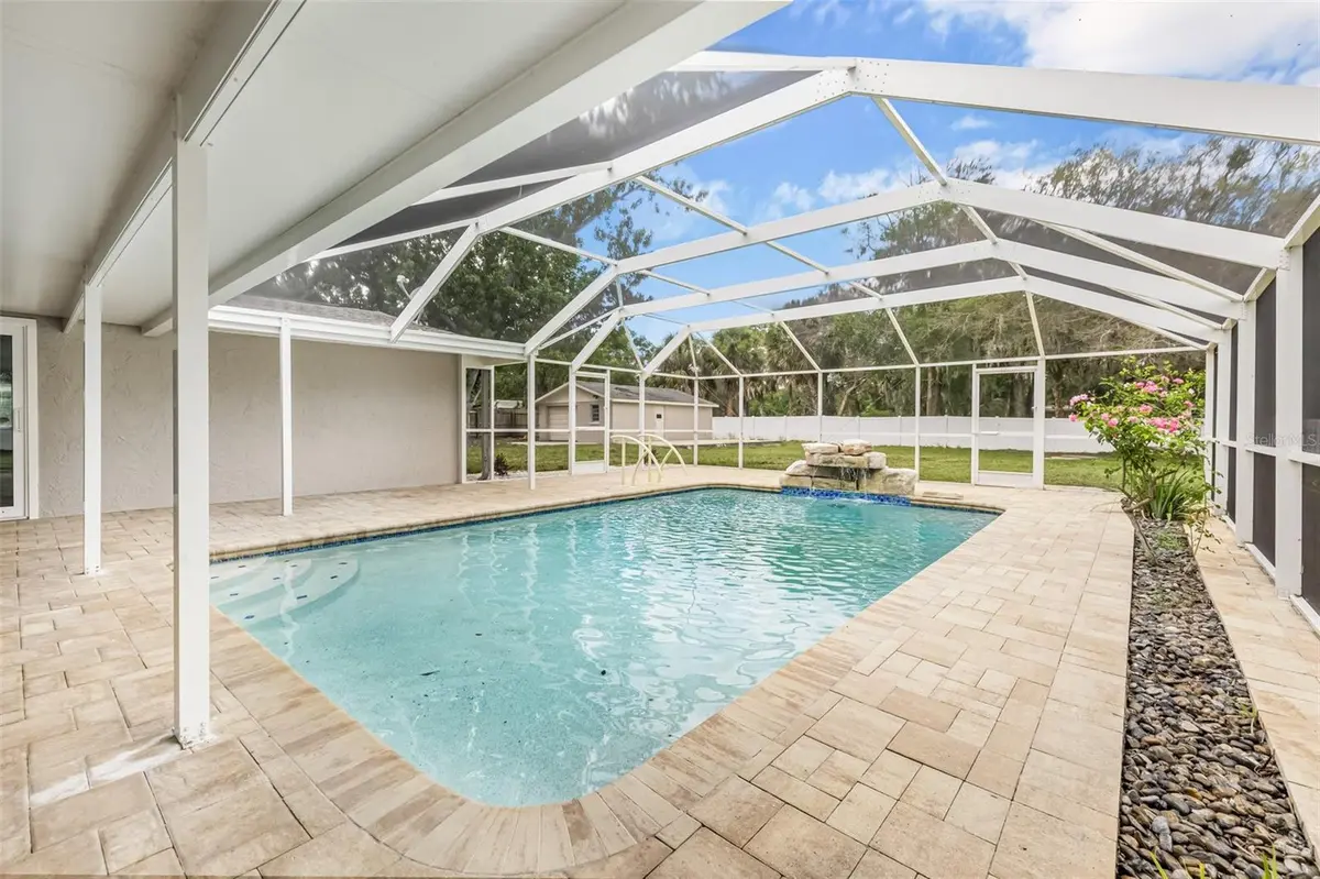 Screened pool at a featured Hudson property